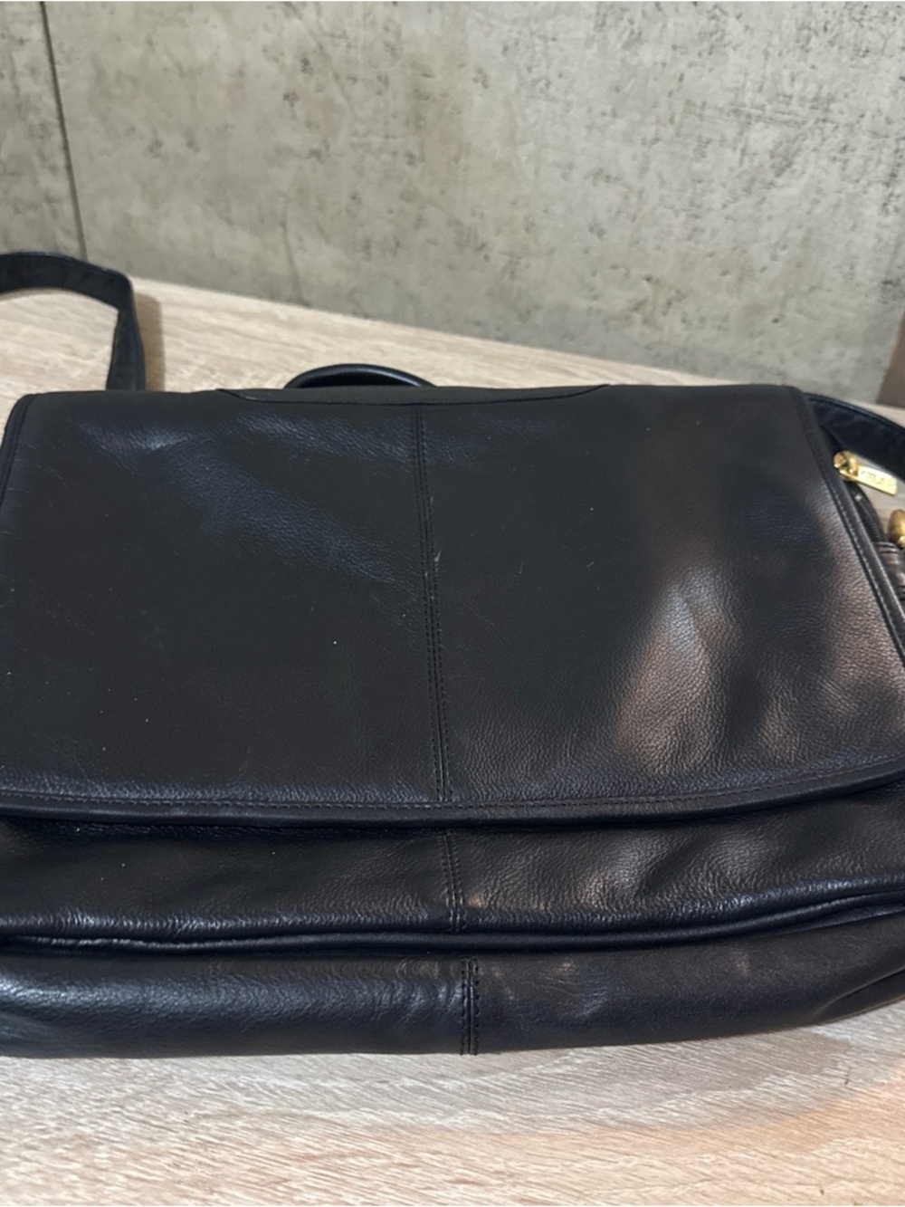 Black Leather Messenger Bag with Gold Hardware
